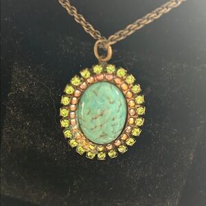 Elegant Turquoise Pendant Necklace with Gold Detailing